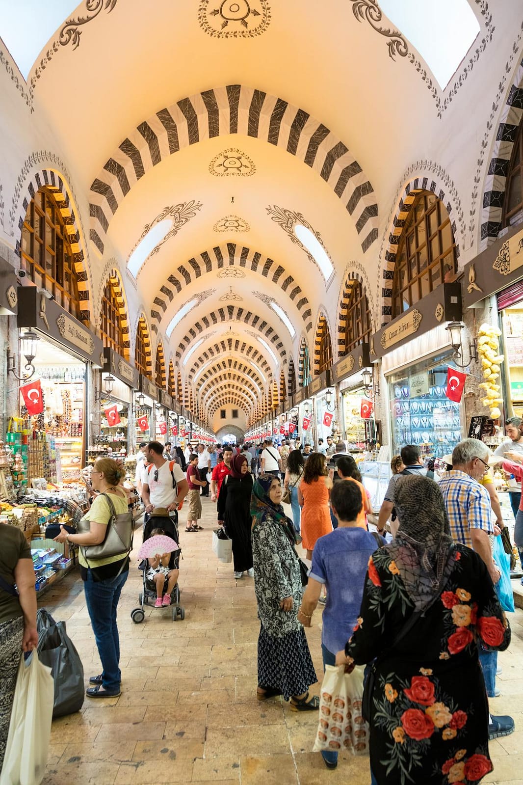 Colourful spices, dried fruits and nuts piled high on display in the Spice Bazaar, Istanbul, Turkey