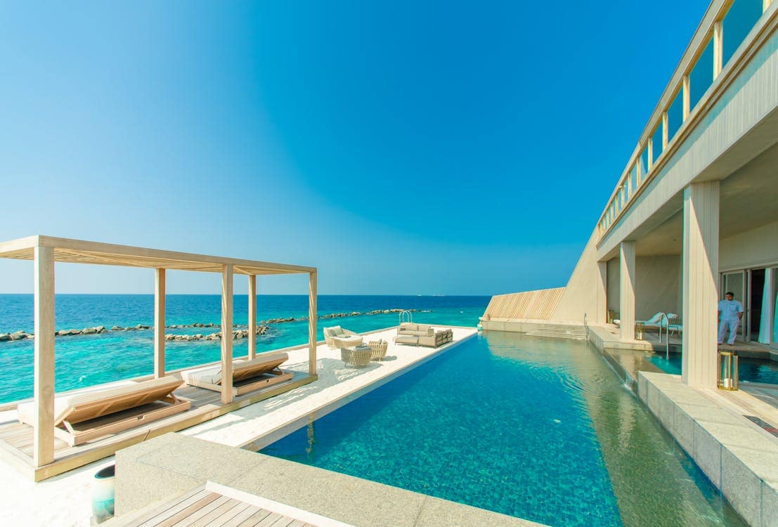 Swimming pool overlooking the sea at a summer holiday resort