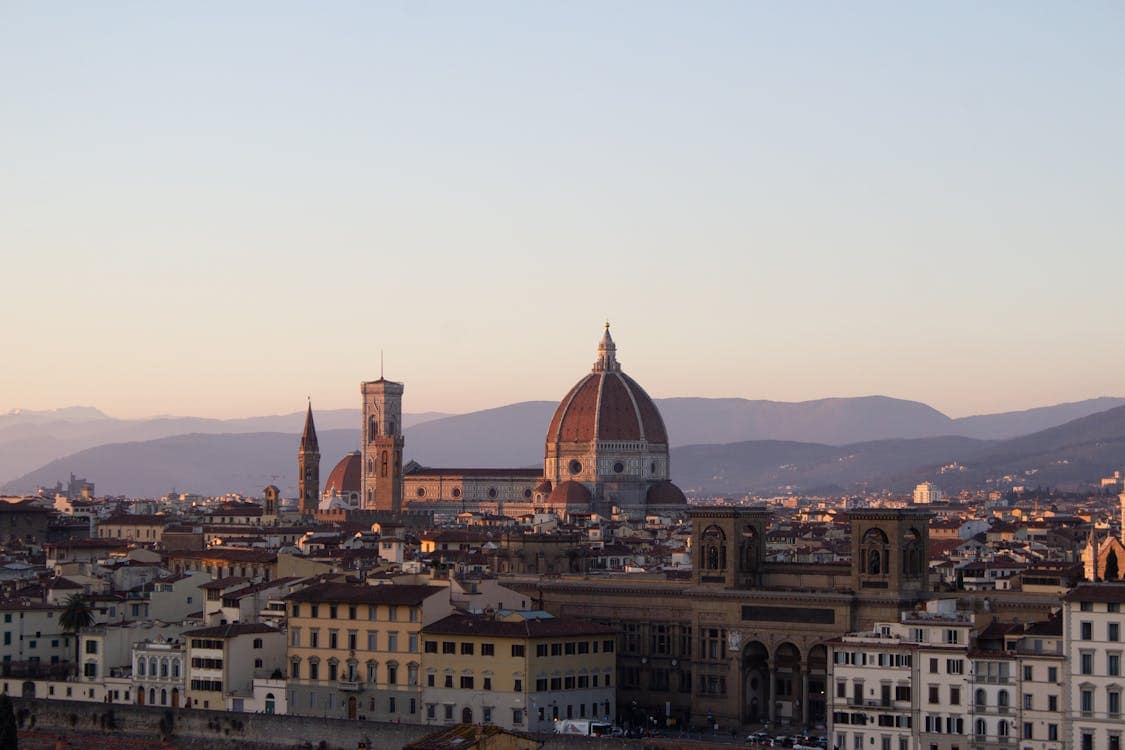 Florence skyline with the Duomo dome rising above the terracotta rooftops of Tuscany