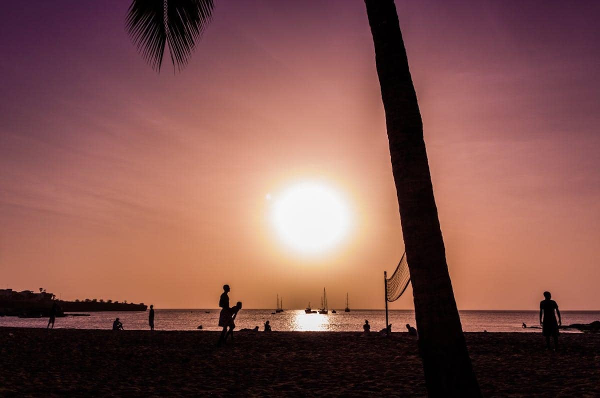 Silhouette of people on a Cape Verde beach at sunset