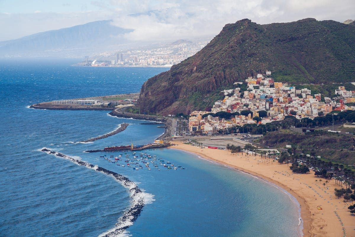 Aerial view of Tenerife's volcanic coastline and resort area