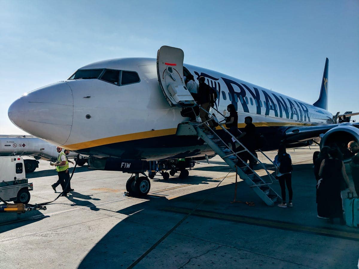 Passengers boarding a Ryanair Boeing 737 at a European airport