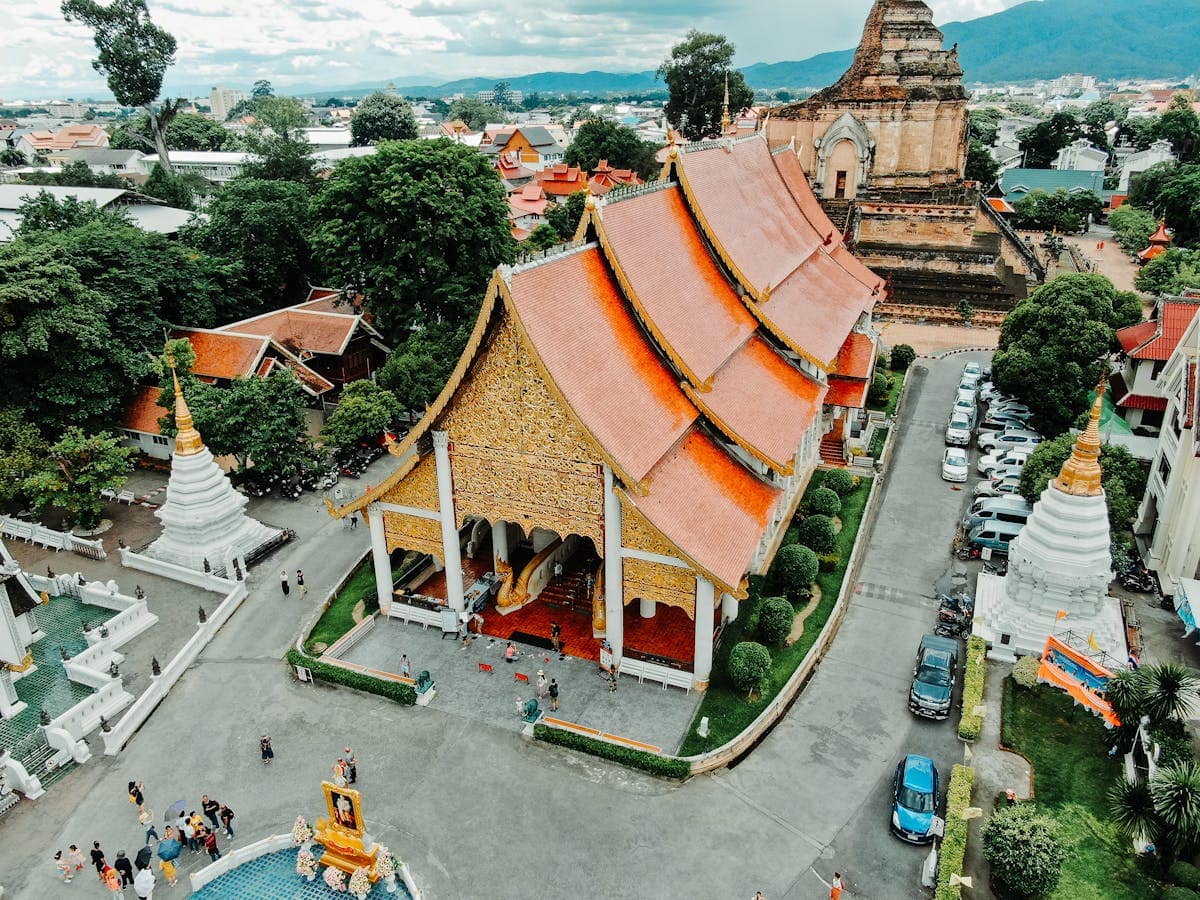 Architectural aerial view of the orange temple of Wat Chedi Luang in Chiang Mai, Thailand