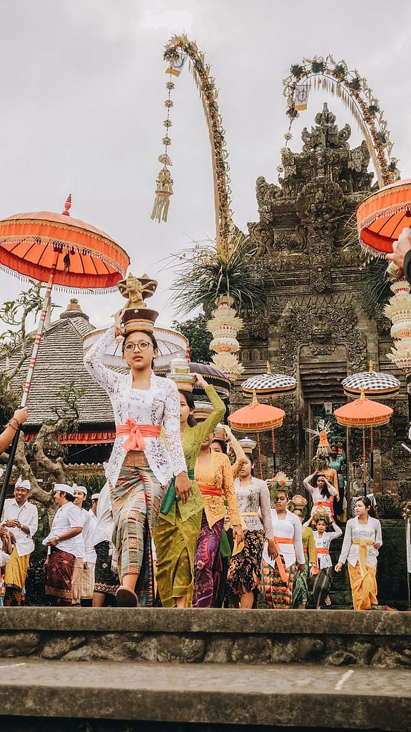 Traditional Balinese temple surrounded by tropical foliage