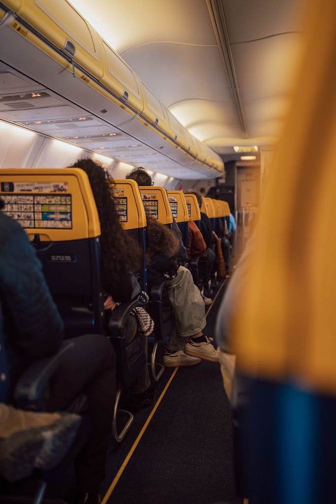 people sitting inside an airplane