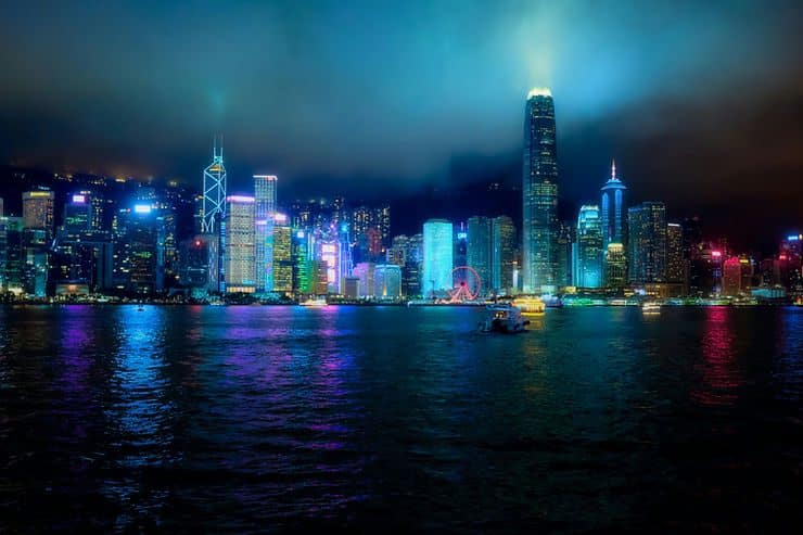 Hong Kong skyline at night with Victoria Harbour in the foreground