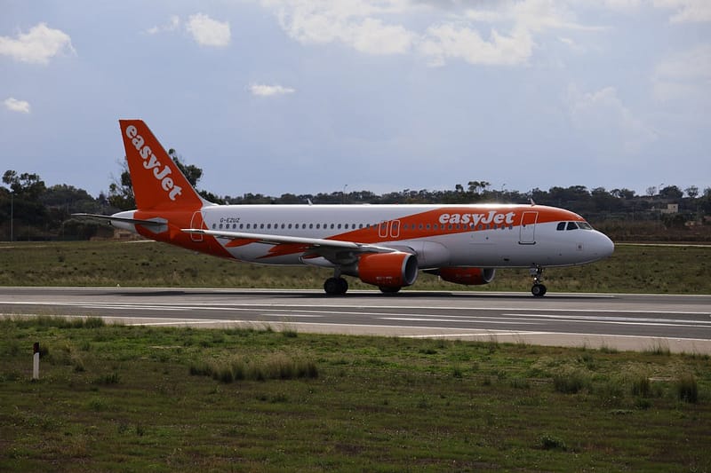 easyJet Airbus A320 aircraft on airport runway at a UK airport