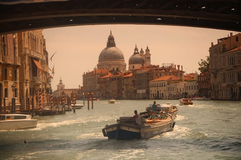 Grand Canal in Venice with gondolas and historic palaces on either side
