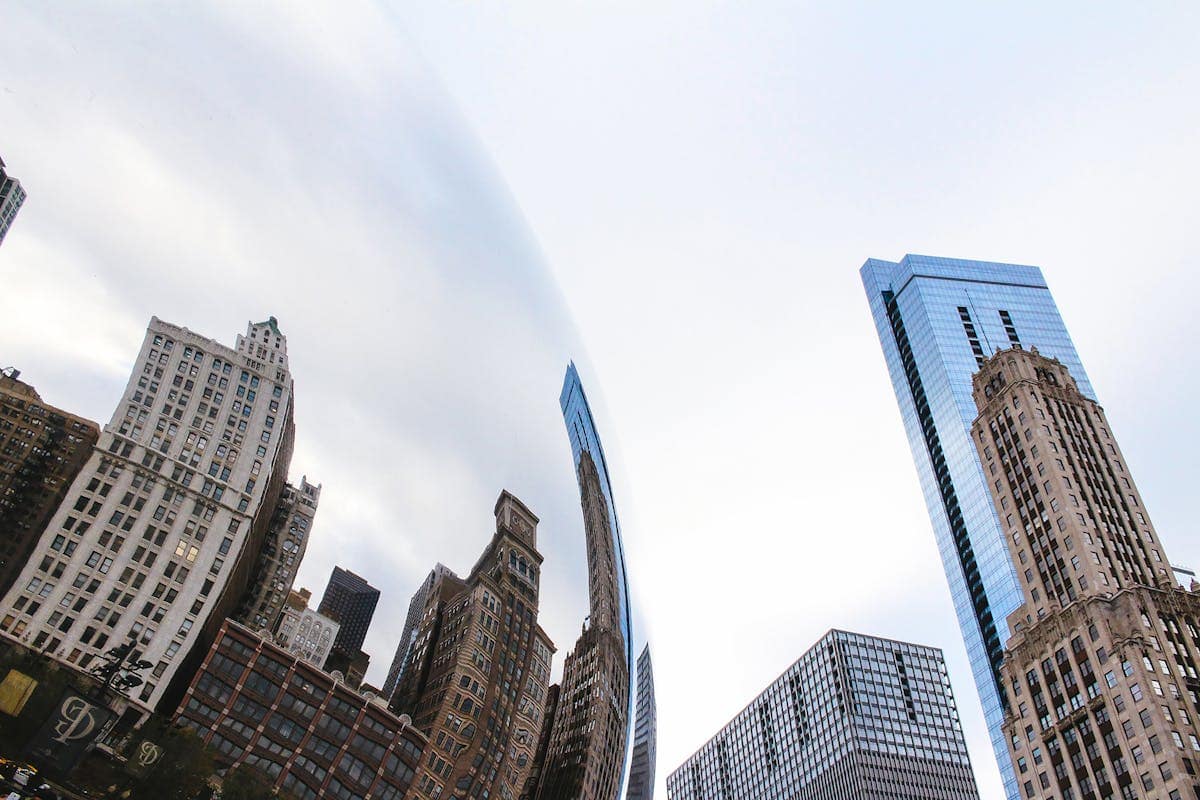 Cloud Gate sculpture, known as The Bean, reflecting the Chicago skyline in Millennium Park