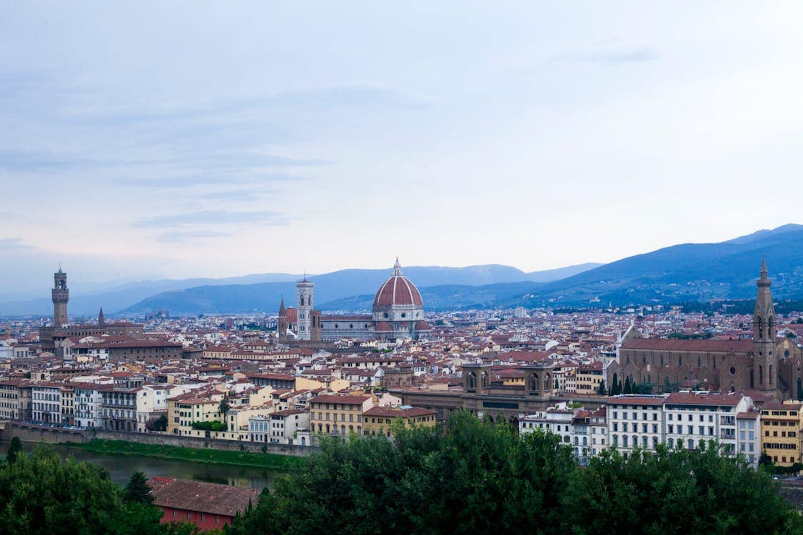 Panoramic view of Florence and the Arno River from Piazzale Michelangelo at dusk
